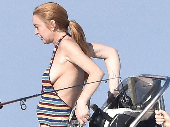 Lindsay Lohan Caught Fishing in Sexy Swimsuit