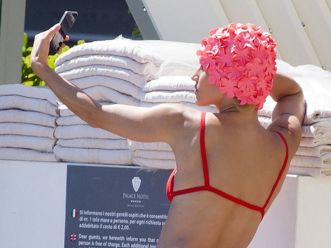 Michelle Hunziker Caught Doing Selfie In Hot Red Bikini