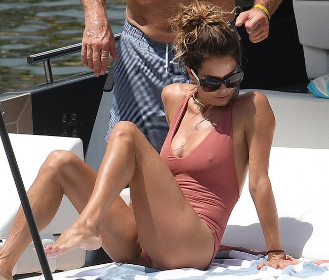 Brooke Burke Tanning In Sexy Swimsuit On A Yacht