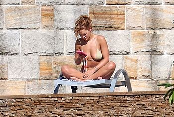 Rita Ora topless photos