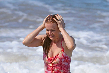 Isla Fisher naked beach pics