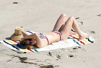 Lana Del Rey sunbathing