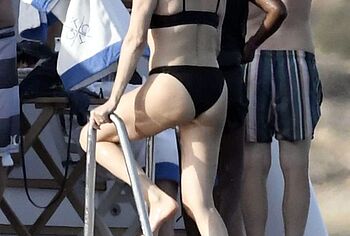 Charlize Theron bikini ass shots