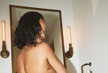 Rihanna topless