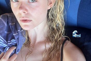 Elle Fanning in transparent dress