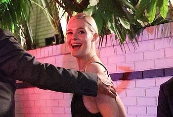 Elle Fanning in transparent dress