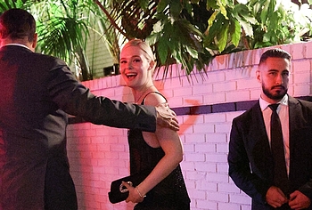 Elle Fanning in transparent dress