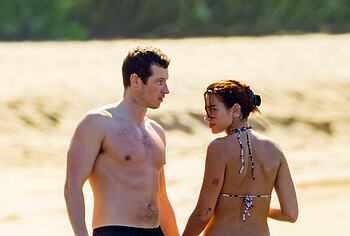 Dua Lipa bikini on a beach