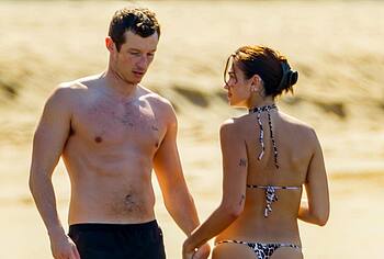 Dua Lipa bikini on a beach