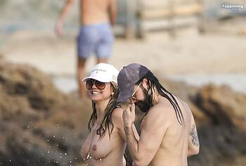 Heidi Klum nude on a beach