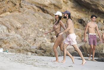 Heidi Klum nude on a beach