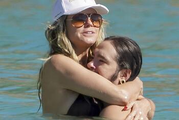 Heidi Klum nude on a beach