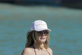 Heidi Klum nude on a beach