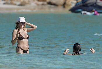 Heidi Klum nude on a beach