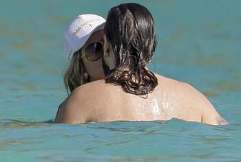 Heidi Klum nude on a beach