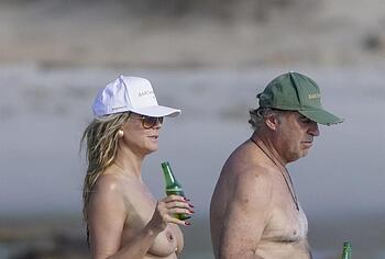 Heidi Klum nude on a beach