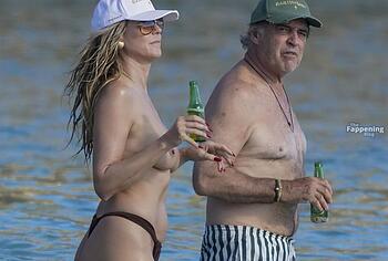 Heidi Klum nude on a beach