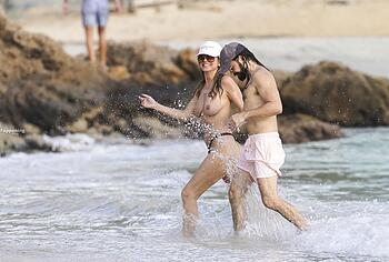 Heidi Klum nude on a beach