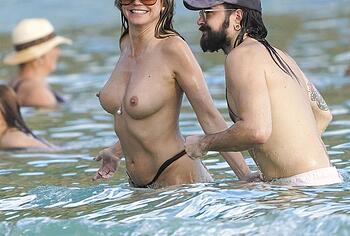 Heidi Klum nude on a beach