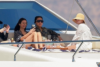 Nina Dobrev Relaxing With Selena Gomez in Bikini