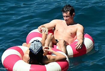 Dua Lipa sexy bikini on a beach