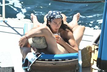 Dua Lipa sexy bikini on a beach