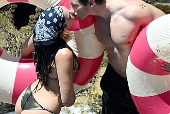 Dua Lipa sexy bikini on a beach