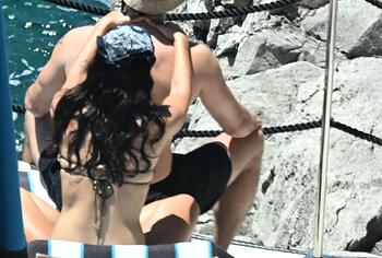 Dua Lipa sexy bikini on a beach