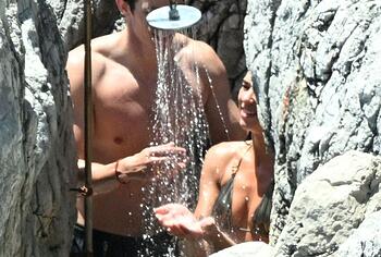 Dua Lipa sexy bikini on a beach