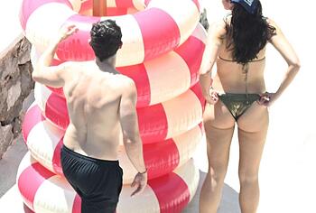 Dua Lipa sexy bikini on a beach