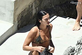 Dua Lipa sexy bikini on a beach
