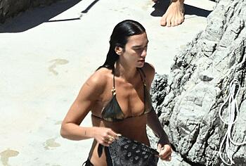 Dua Lipa sexy bikini on a beach
