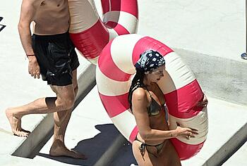 Dua Lipa sexy bikini on a beach