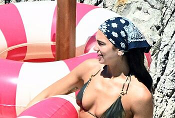 Dua Lipa sexy bikini on a beach
