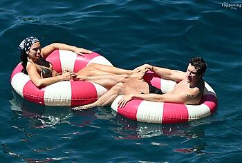 Dua Lipa sexy bikini on a beach