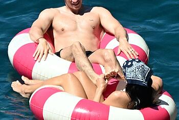 Dua Lipa sexy bikini on a beach