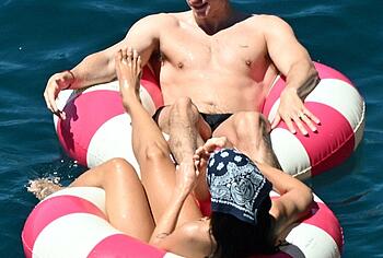 Dua Lipa sexy bikini on a beach