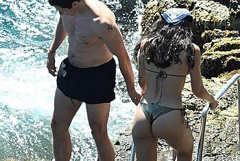 Dua Lipa sexy bikini on a beach