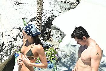 Dua Lipa sexy bikini on a beach