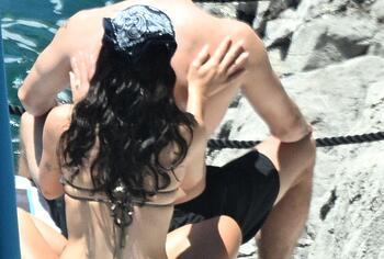 Dua Lipa sexy bikini on a beach
