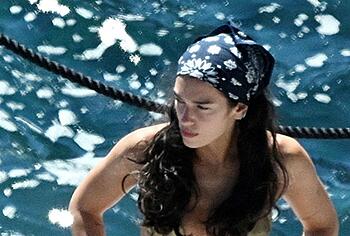 Dua Lipa sexy bikini on a beach