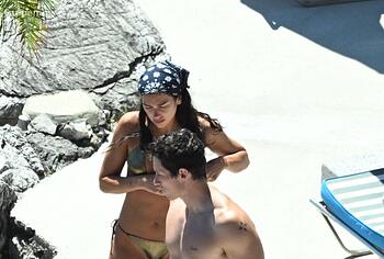 Dua Lipa sexy bikini on a beach