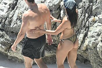 Dua Lipa sexy bikini on a beach