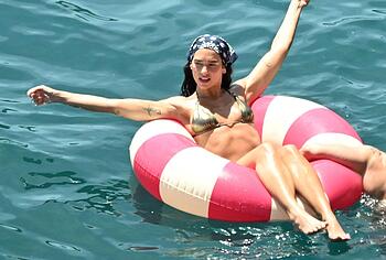 Dua Lipa sexy bikini on a beach