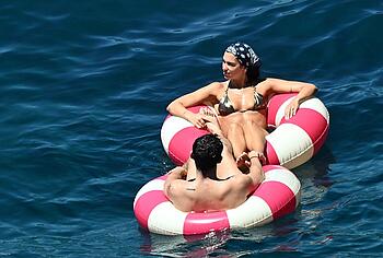 Dua Lipa sexy bikini on a beach