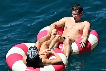 Dua Lipa sexy bikini on a beach