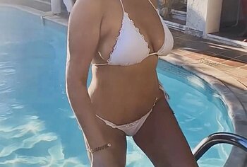 Emily Atack bikini and lingerie photos