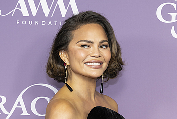 Chrissy Teigen See Through And Boobs Photos