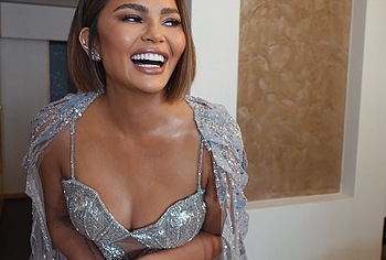 Chrissy Teigen See Through And Boobs Photos