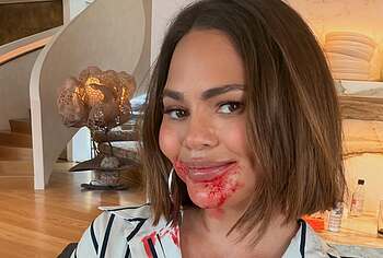 Chrissy Teigen See Through And Boobs Photos